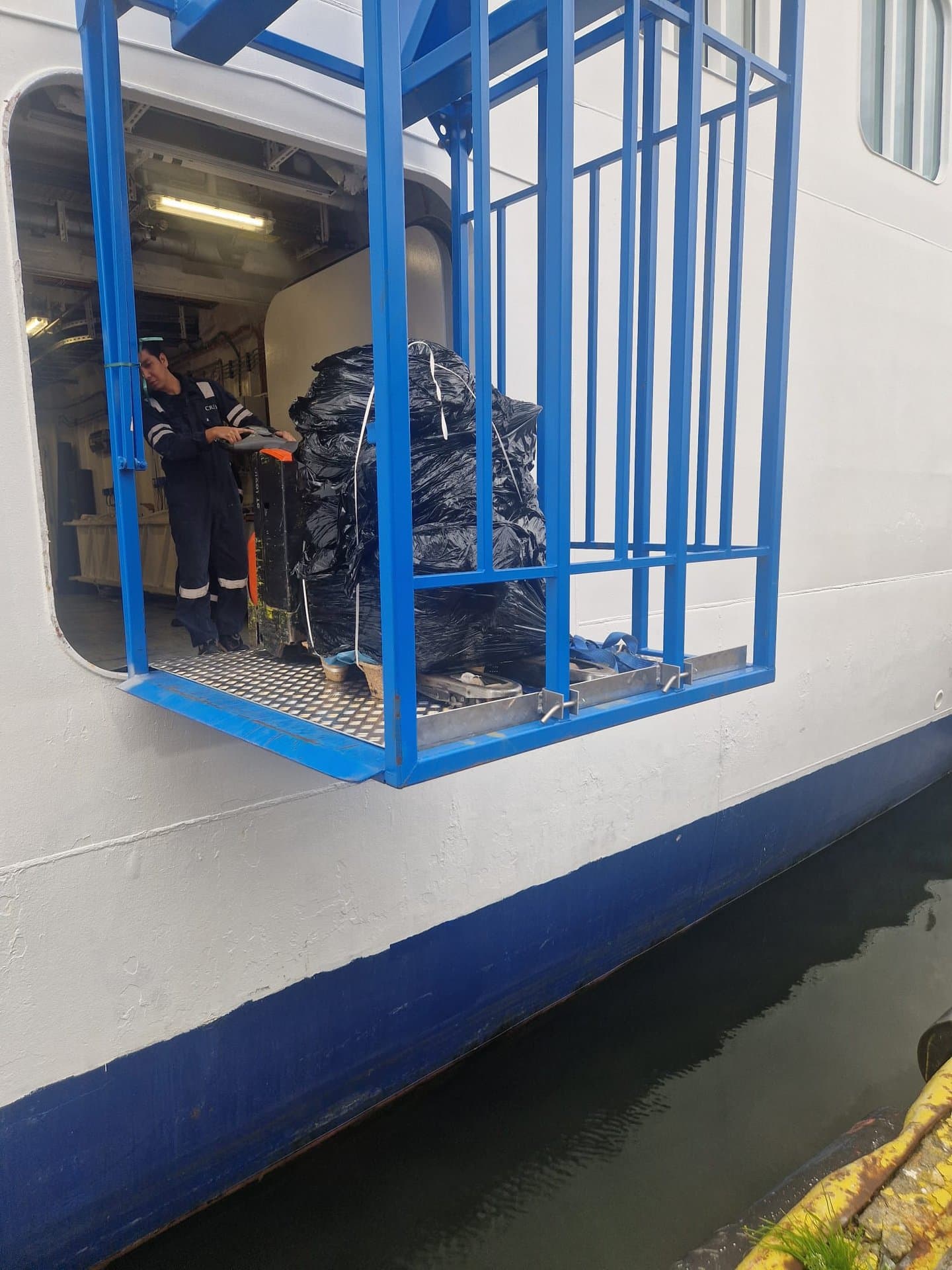 Cage loaded with luggage